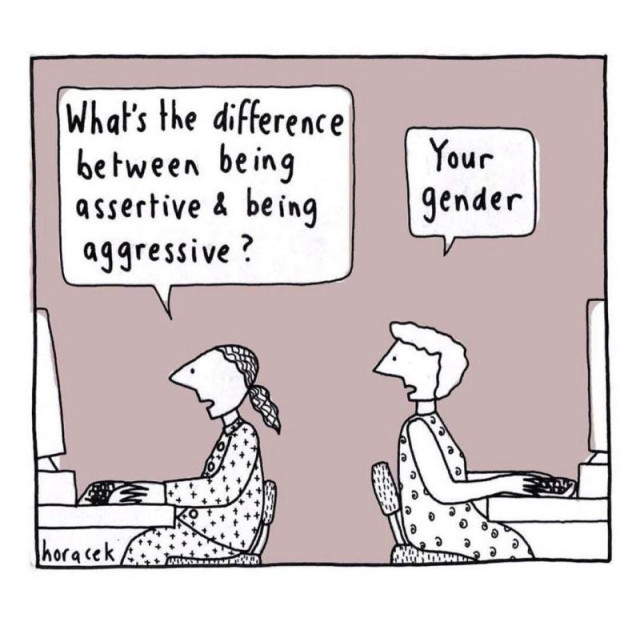 Cartoon: two women sitting at computers; one says to the other 'What's the difference between being assertive & being aggressive?' to which the other replies.... 'Your gender'! 