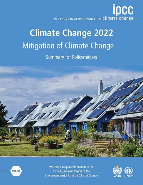 The image features the cover of the "Climate Change 2022: Mitigation of Climate Change" report by the Intergovernmental Panel on Climate Change (IPCC). It includes solar panels on rooftops, greenery.