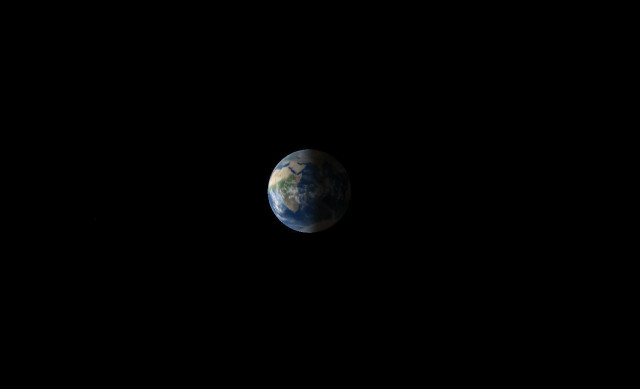 Planet Earth in space, viewed from far away.