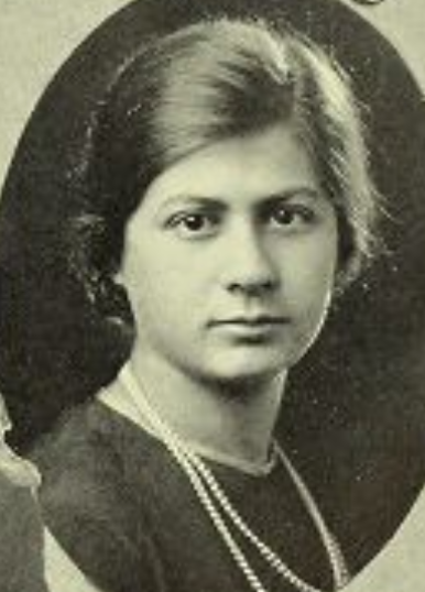 More details A young white woman, dark hair parted at the side, wearing a dark dress or blouse with a long strand of pearls  No photographer credited - Barnard College, Mortarboard (1925 yearbook): 165.