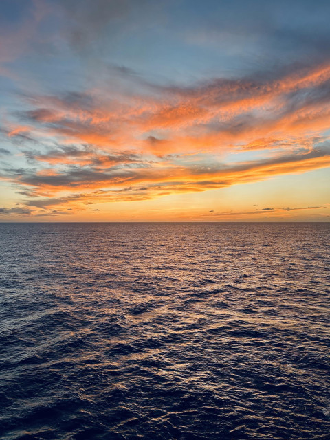 A fiery sunset over the Caribbean.