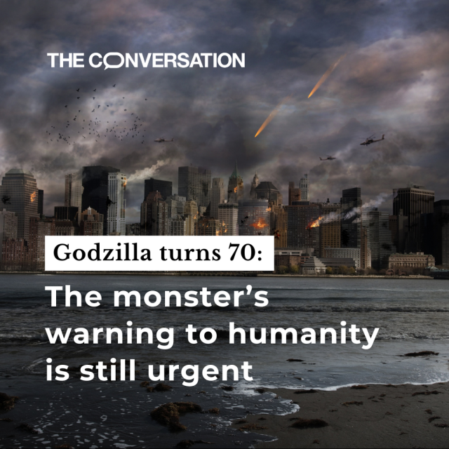 The graphics reads "Godzilla turns 70: The monster's warning to humanity is still urgent". We see the skyline of a city in flames. 