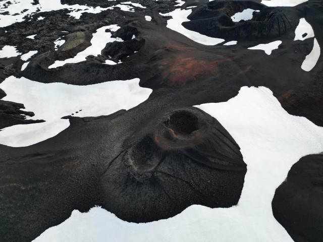 A drone view shows craters from the 1961 eruption of the Askja volcano in Vatnajokull National Park, Iceland, August 2024. REUTERS/Stoyan Nenov