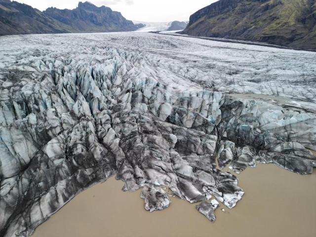 A drone view shows Skaftafellsjokull, an outlet glacier of the Vatnajokull ice cap, in southern Iceland, August 2024.  REUTERS/Stoyan Nenov