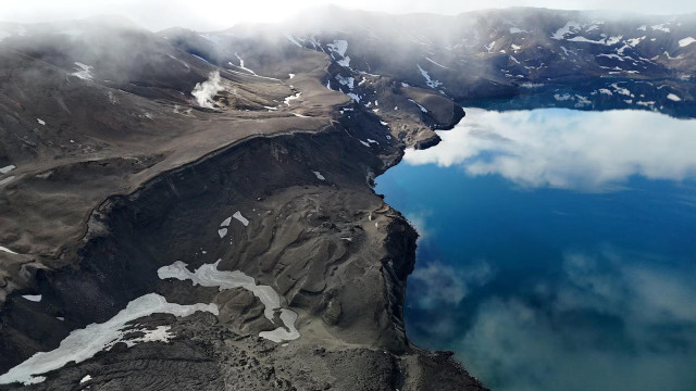 A drone view shows Oskjuvatn, a caldera lake created during the 1875 eruption of the Askja volcano, in Vatnajokull National Park, Iceland, August 2024. REUTERS/Stoyan Nenov