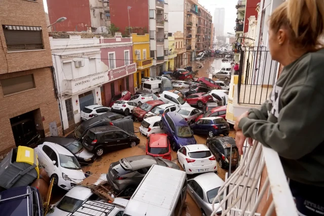 A city street jammed with cars after the intense rain and flooding.