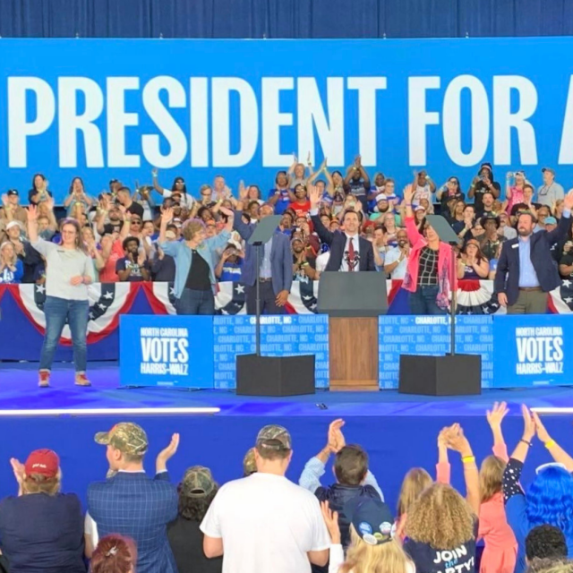 Picture of Sarah Taber on the stage at the Kamala Harris rally, along with Elaine Marshall, Braxton Winston, Jeff Jackson, Natasha Marcus, and Wesley Harris