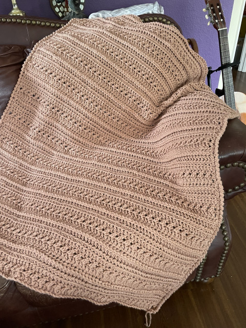 Crochet throw with textured rows