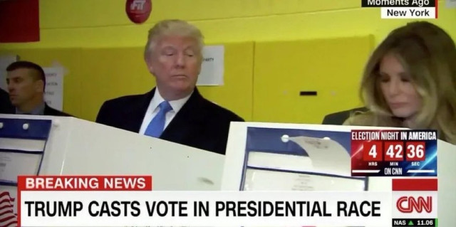 Donald Trump peers into Melania’s voting booth while ahead votes. 