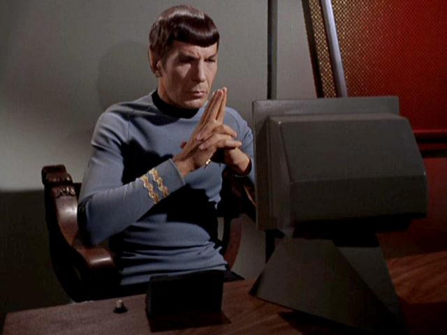 Spock, like all of us, stares at his computer. 