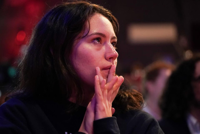 A woman reacts to early returns at a Democratic watch party on Election Day in Philadelphia, Pennsylvania. REUTERS/Seth Herald