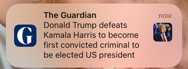 Guardian phone notification saying "Donald Trump defeats Kamala Harris to become first convicted criminal to be elected US president"