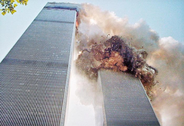 Twin towers on fire on 9/11 after two passenger planes hit the towers of the former #WorldTradeCenter

Source:

https://www.boredpanda.com/blog/wp-content/uploads/2017/09/rare-911-twin-tower-photos-14-59b657dc9fc68__700.jpg