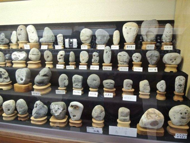 A museum in Japan that showcases various naturally formed rocks with faces on them.⁠