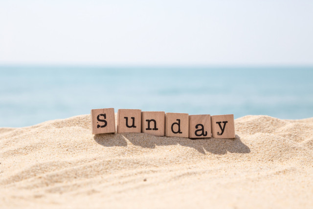 meme of a sandy ocean beach topped by the word 'Sunday' on six little wooden squares 