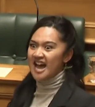 clip from the video showing the wide eyes and open mouth of the lawmaker that started the fierce haka protest/dance/chant.