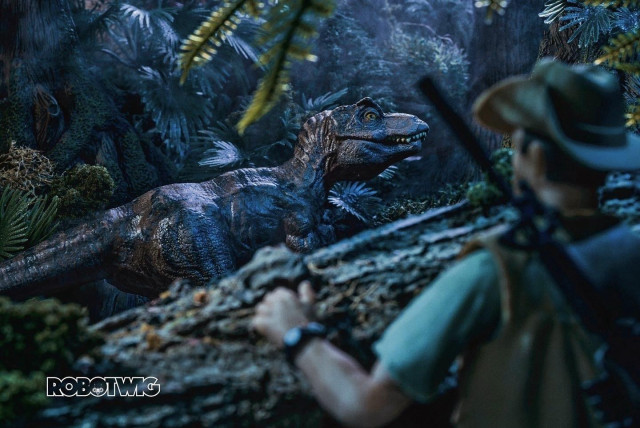 Hunter hides behind fallen log gun on back. Trex Faun is seen strolling through jungle. Set at nighttime