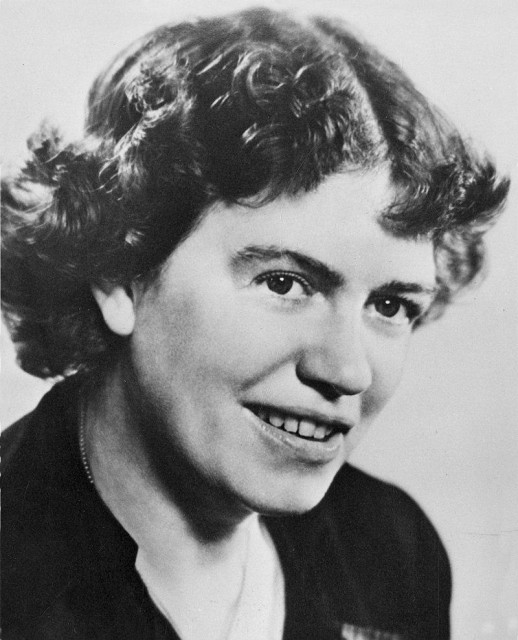 Margaret Mead in 1948. She appears in a thoughtful pose, wearing a tailored dress or blouse with a modest yet professional demeanor.