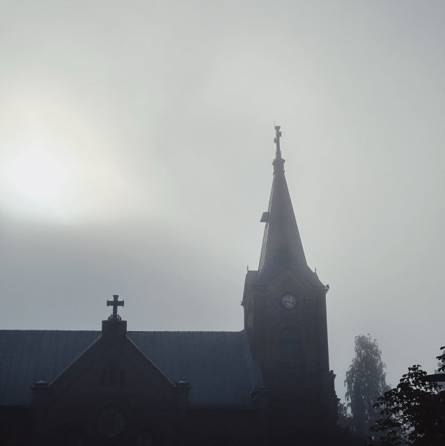 Fog around a church