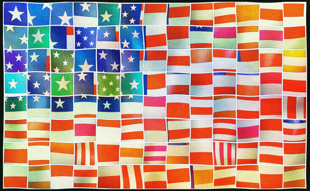 An American flag has been broken into little squares and loosely arranged so that the star field and stripes are generally where they should be, but scrambled a bit.