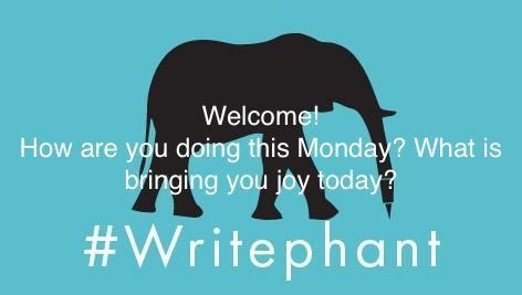 The profile of an elephant with a pen for a trunk in black. Welcome! How are you doing this monday? What is bringing you joy today? #Writephant is written in white. All on a blue background.