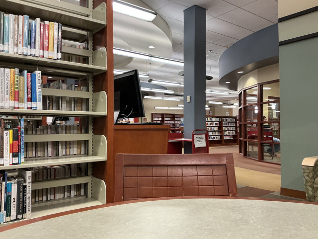 A picture of the inside of a library. 