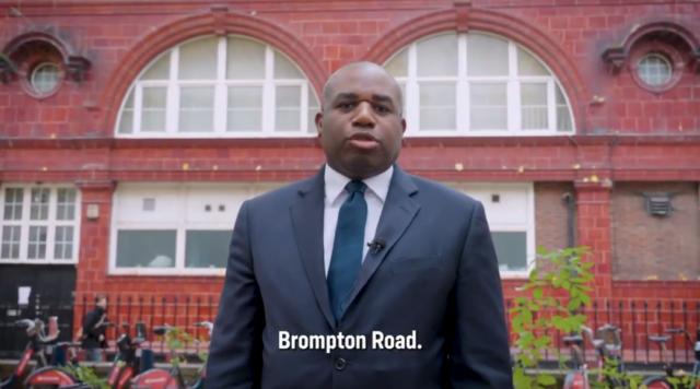 David Lammy in a suit standing outside Brompton Road station, London, U.K.