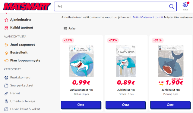 Kuvakaappaus Matsmart-nettikaupan sivulta. Kolme erilaista Juhlakoriste Hai-tuotetta; sellaisia lähinnä lasten juhliin tarkoitettuja haikala-aiheisia koristeita ja päähineitä.