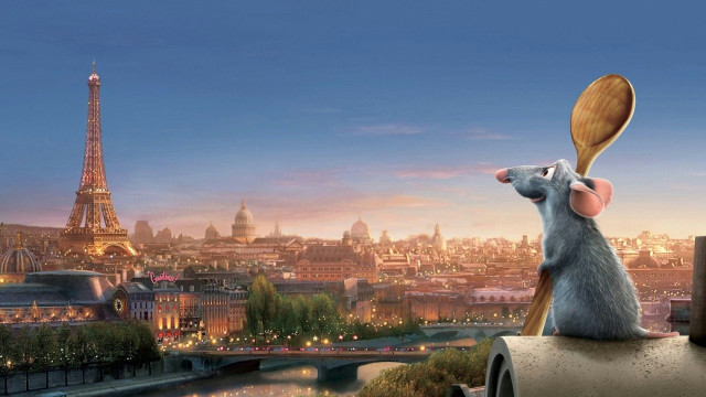 A rat named Remy holding a wooden spoon on a rooftop in Paris looking at the Eiffel Tower. 