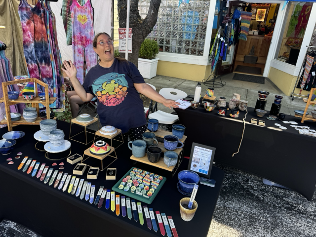 Me on a market stall with lots of fun ceramics 