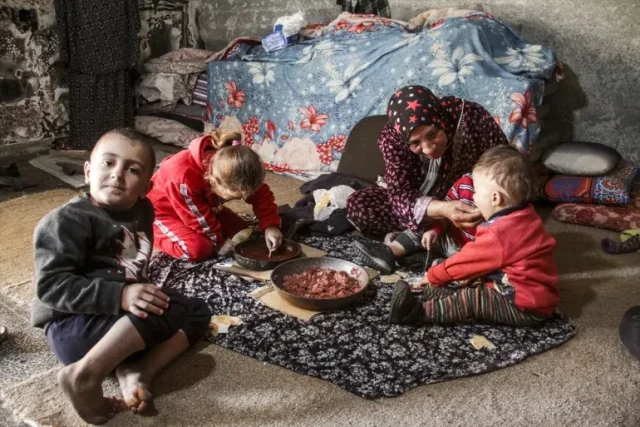 The family sought refuge in a school in Gaza City after having to leave Beit Hanoon [Mahmoud İssa/Anadolu]