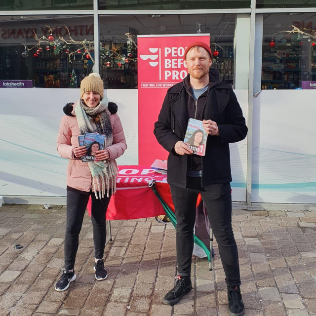 Denman Rooke and another PBP member in front of a stall on Shop Street in Galway.