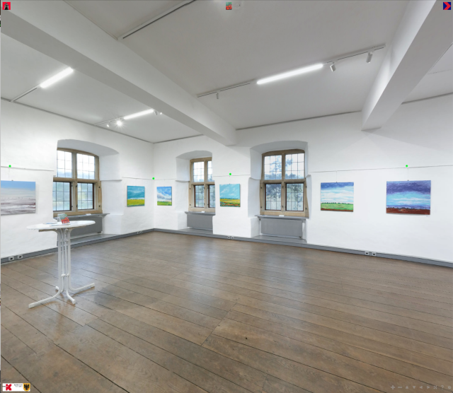 Screenshot of the exhibition room at Torhaus Rombergpark Dortmund with the actual exhibition. A renovated room dating back to the medevial with historc windows with stone frames, a oak-wood floor and white walls. On the walls there are hanging paintings of ladscapes in bright, friendly colours