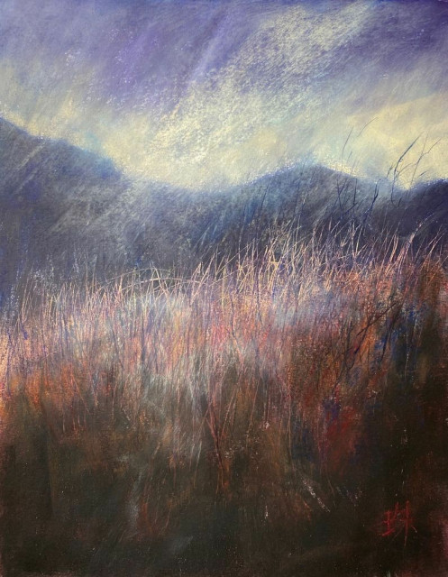 A vertical mixed media painting of desolate field of dried grass. Moody, misty mountains in the background. 