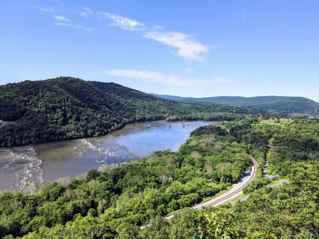 The view from the peak of a hike overlooking the Potomac River and the hills outside of Harpers ferry West Virginia