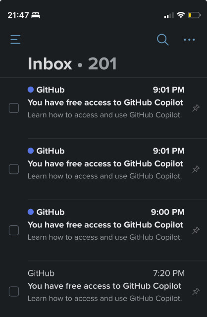 Screenshot of mail app showing four identical emails from Microsoft GitHub informing me I have free access to GitHub Copilot (sent at 7:20PM, 9:00PM, and two at 9:01PM)