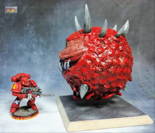 Cacodemon scale model left side. Scale shot with a space marine miniature.