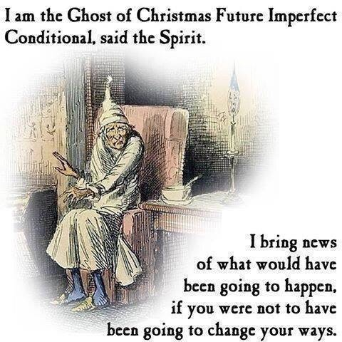 A drawing of a frail, hooded figure, resembling a ghost, sits hunched on a chair. The figure is dressed in flowing, light-coloured robes.  A lit candle is visible on a table in the background. The text above the drawing says, "I am the Ghost of Christmas Future Imperfect Conditional, said the Spirit." Below the drawing, more text reads, "I bring news of what would have been going to happen, if you were not to have been going to change your ways."