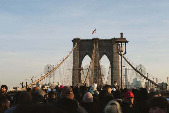 The Brooklyn Bridge with Brooklyn in the background.