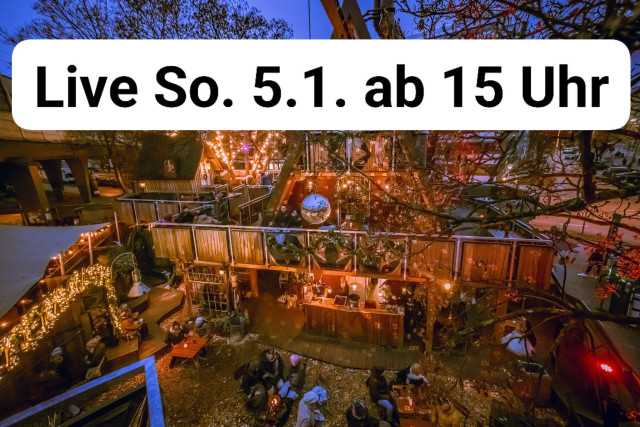 Ein Bild von der Location Gans Woanders, ein Hexenhäuschen aus Holz mit angeschlossenen, umfriedeten Biergarten.  Der Text "Live So. 5.1. ab 15 Uhr" ist darüber gelegt.