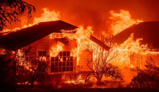 A home burns during the Eaton fire in the Altadena area of Los Angeles County, California on January 8, 2025.
(Josh Edelson/AFP via Getty Images) 