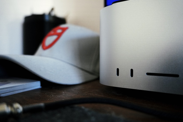 A Tudor cap and a Apple Mac Studio.