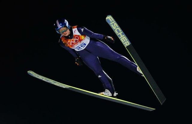 Carina Vogt midair during her ski jumps