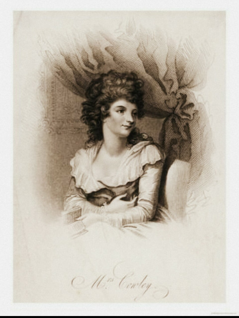 an engraving of Hannah Cowley. She is a white woman with a mass of dark hair.