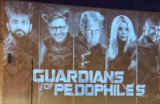 Street art in Los Angeles shows GOP members with the title "Guardians of Pedophiles."