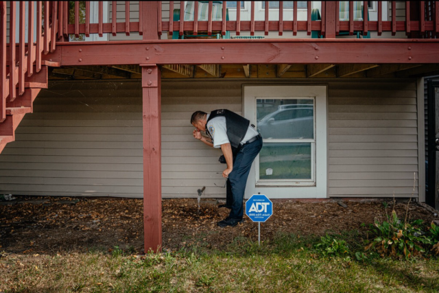 A Chicago police officer rinsed his eyes with water on Tuesday after federal agents used tear gas on the far South Side.