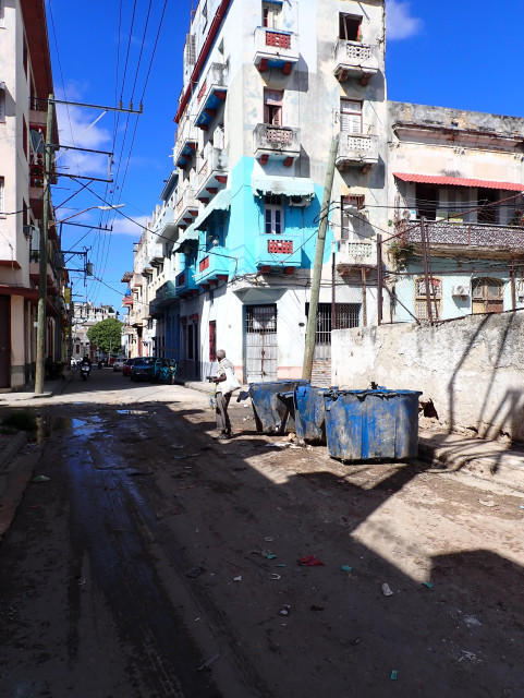 Another man inspecting thrash. Thrash collection is also way less reliable than before, with many of the containers being badly damaged and garbage trucks passing by irregularly. In many cases, the street corners where the bins are placed get damaged and start to collect water and large amounts of garbage — perfect breeding ground for mosquitos, which forms part of the explanation of the current Chikungunya epidemic in Cuba.