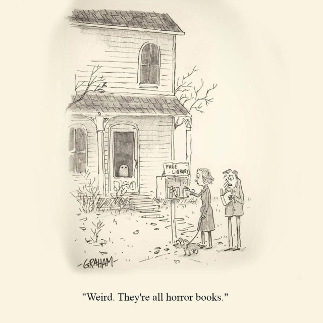 A cartoon illustration of a man and a woman walking their dog stopped at a free library stand in front of a house haunted by a little ghost in the doorway. The man is speaking. Caption reads "Weird. They're all horror books."