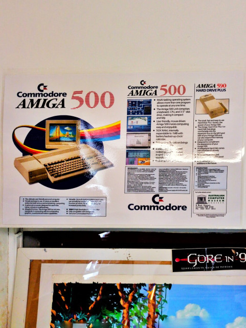 A promotional poster for the Amiga 500 and some of its accessories.