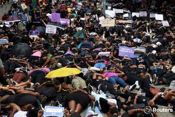 Dozens of protesters stage a die in at a protest in Joburg